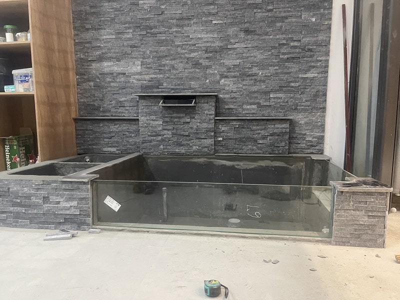 Tranh đá ốp tường và Bể cá mini